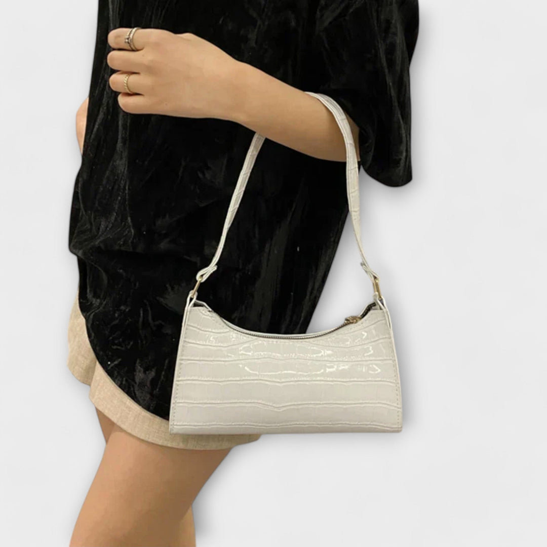 Nora. Glänzende Lederhandtasche