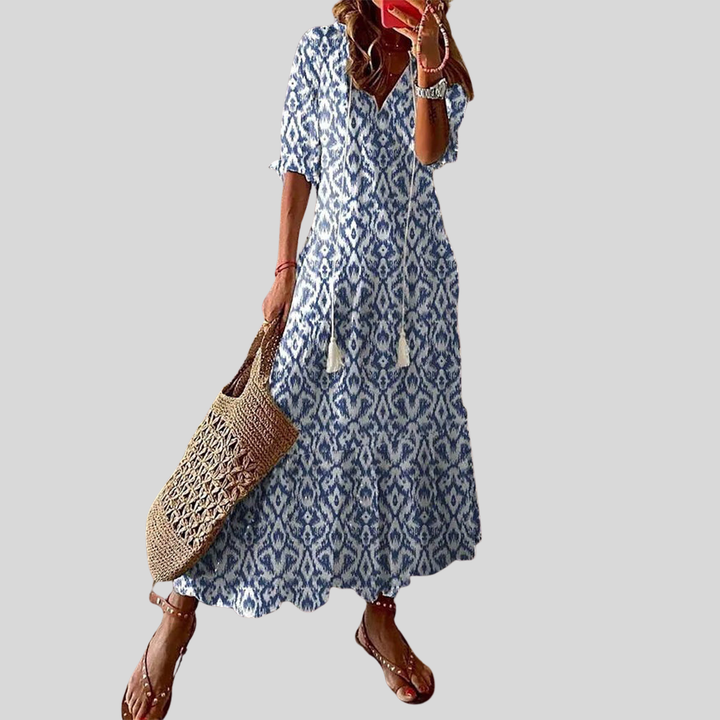Damen Maxi-Kleid | Blumenmuster, Quastenband, Stufenrock & Boho Sommerstil