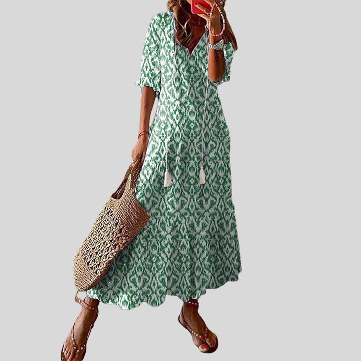 Damen Maxi-Kleid | Blumenmuster, Quastenband, Stufenrock & Boho Sommerstil