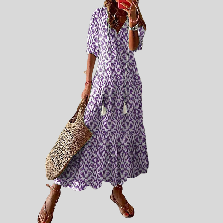 Damen Maxi-Kleid | Blumenmuster, Quastenband, Stufenrock & Boho Sommerstil