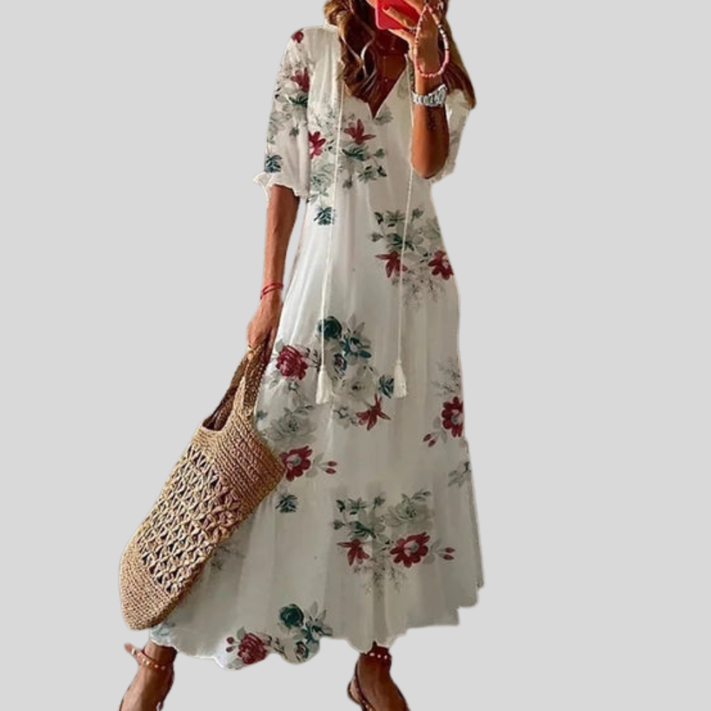 Damen Maxi-Kleid | Blumenmuster, Quastenband, Stufenrock & Boho Sommerstil