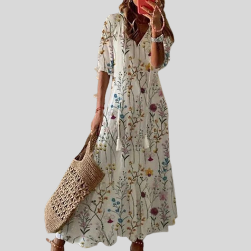 Damen Maxi-Kleid | Blumenmuster, Quastenband, Stufenrock & Boho Sommerstil